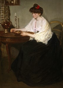 Woman Sitting at a Table